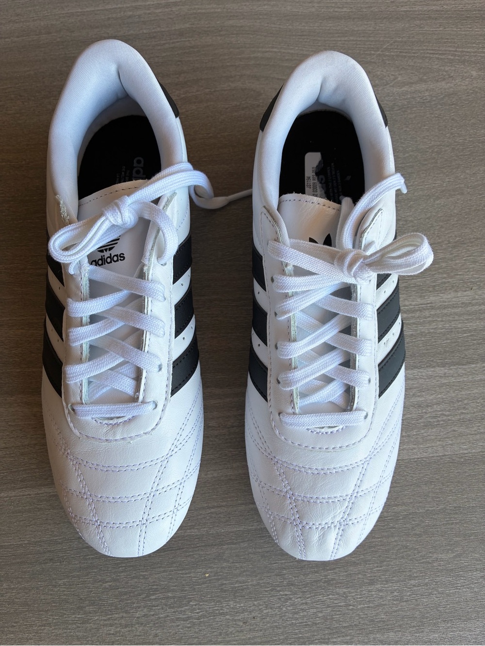 adidas Men’s White Sneakers with Black Three Stripes